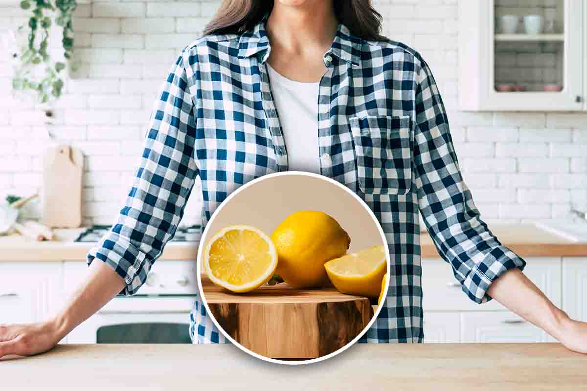 Limoni, persona e tavolo da cucina